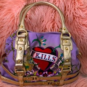 Ed hardy purse for sale, in great shape. Even comes with straps.